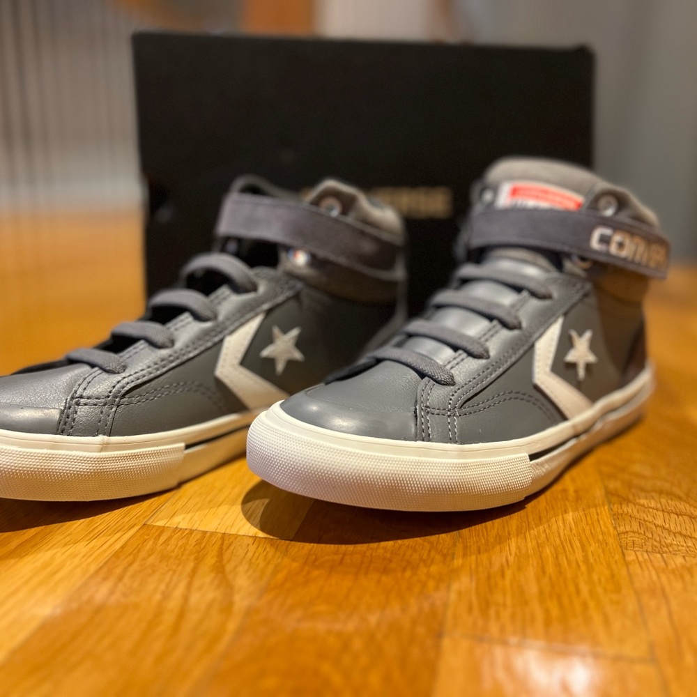 Grey and white converse sneakers